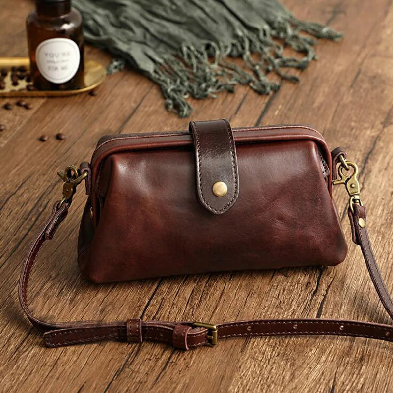 Herdis | Bolsa clásica y compacta en cálido tono cognac