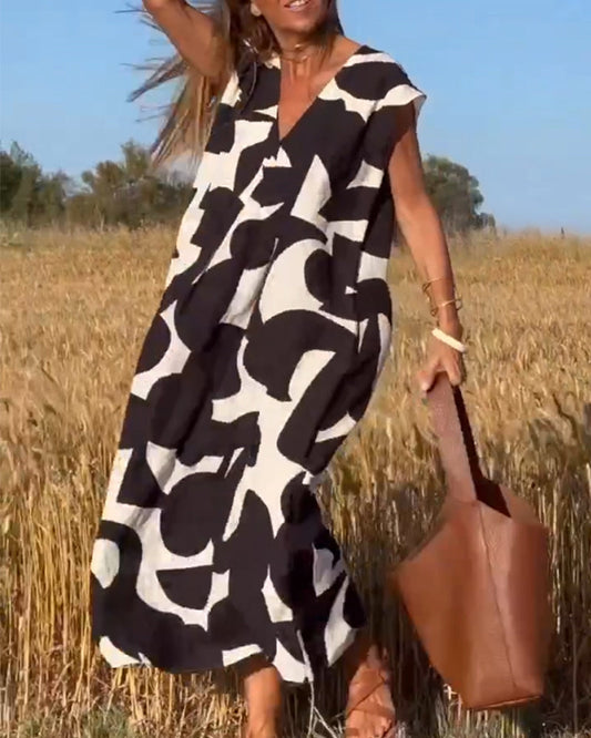 SITA - Vestido con estampado y escote en V
