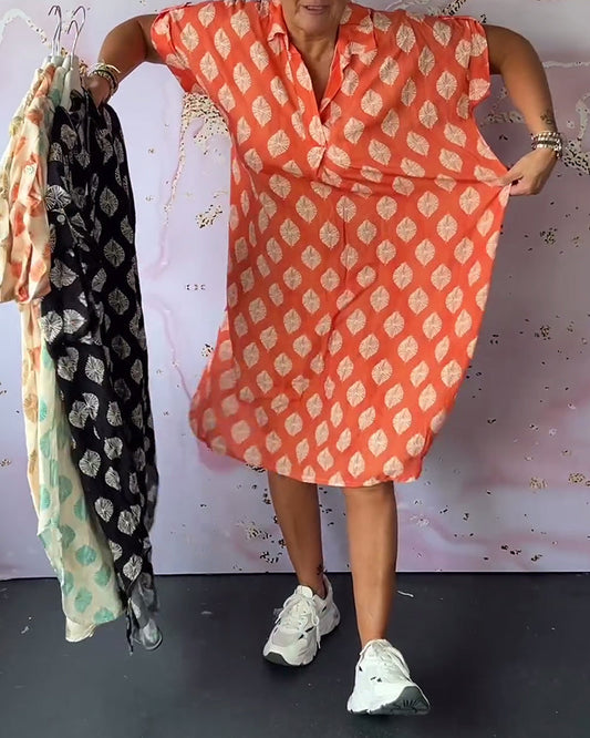 ELEANORA – VESTIDO CAMISERO IMPRESO CON SOLAPA SUELTA
