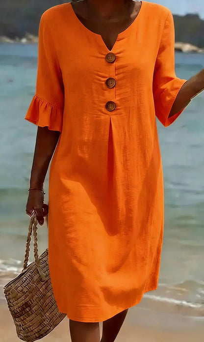 Vanesa | Vestido de lino con textura, mangas abullonadas y botones
