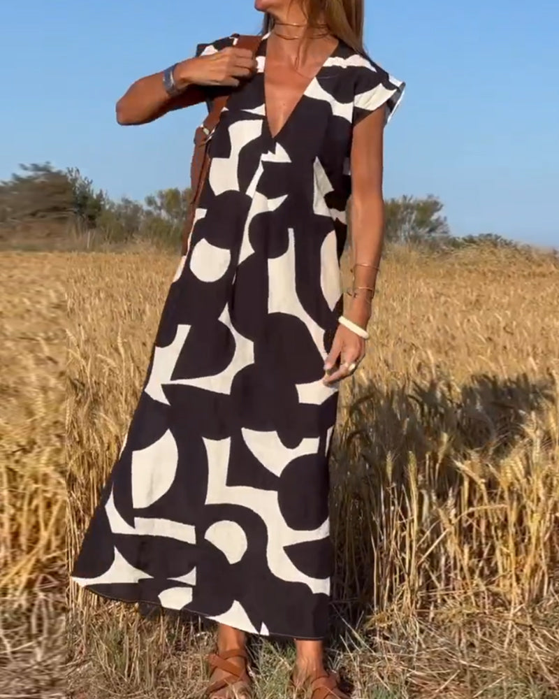 SITA - Vestido con estampado y escote en V