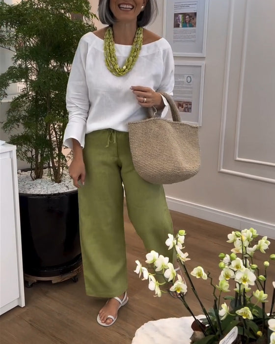 Camiseta blanca de cuello redondo con mangas largas + Pantalones casuales anchos verdes