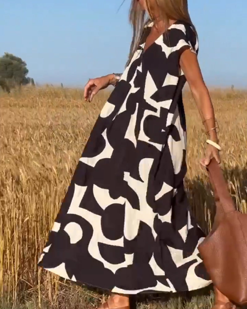 SITA - Vestido con estampado y escote en V