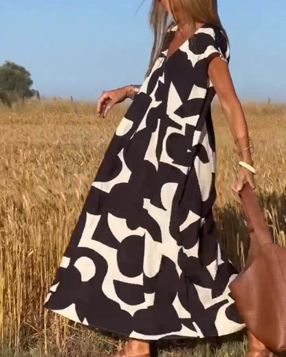 SITA - Vestido con estampado y escote en V