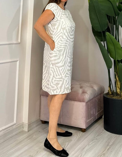 Nelia - Vestido de estampado de cebra con cuello redondo