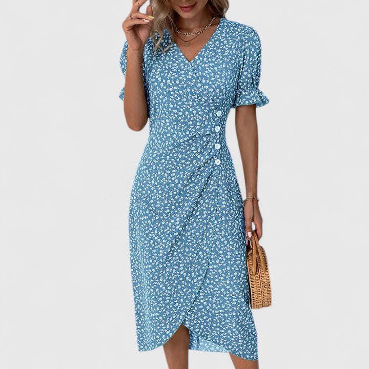 LEILA – VESTIDO ENVOLVENTE CON ENCANTO FLORAL