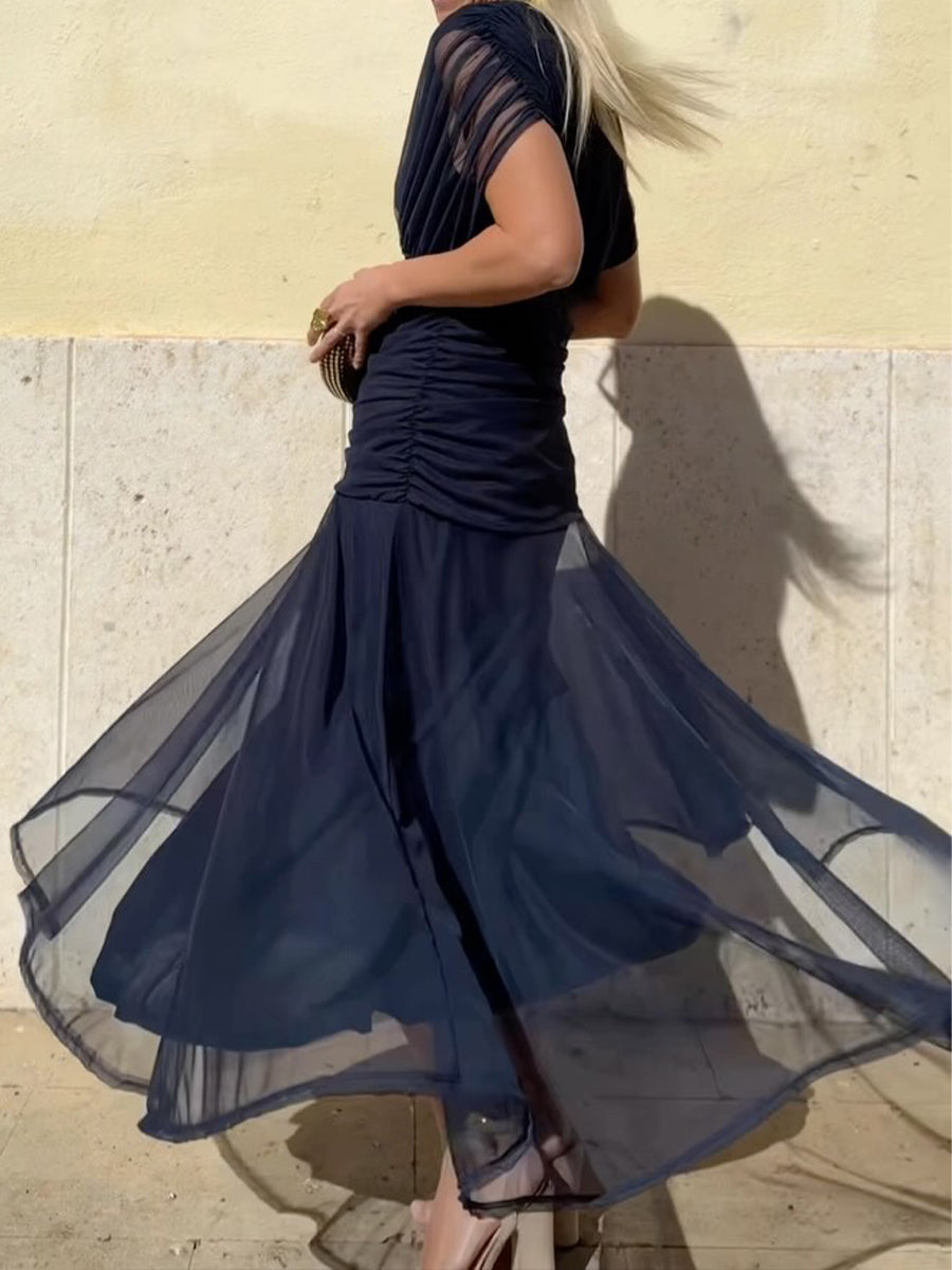 JENNIE – EL ELEGANTE VESTIDO MIDI DESCUBIERTO EN LOS HOMBROS