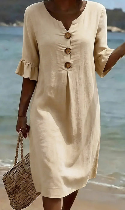 Vanesa | Vestido de lino con textura, mangas abullonadas y botones