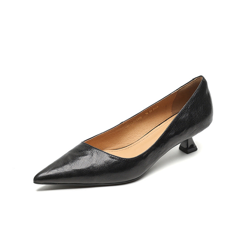 Annie - Elegantes botines de piel con tacón medio para mujer