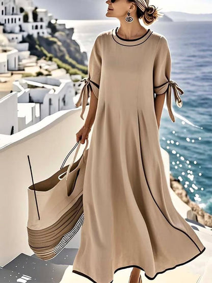 Vestido suelto de mujer con nudo y rayas