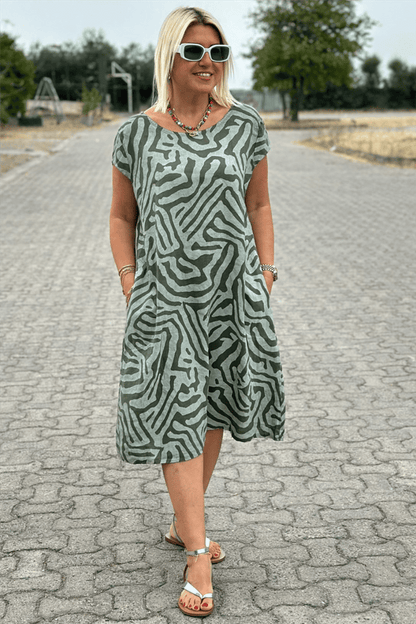 Nelia - Vestido de estampado de cebra con cuello redondo
