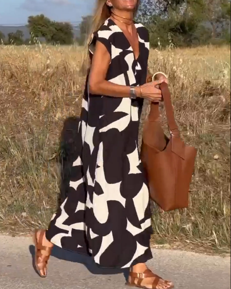 SITA - Vestido con estampado y escote en V