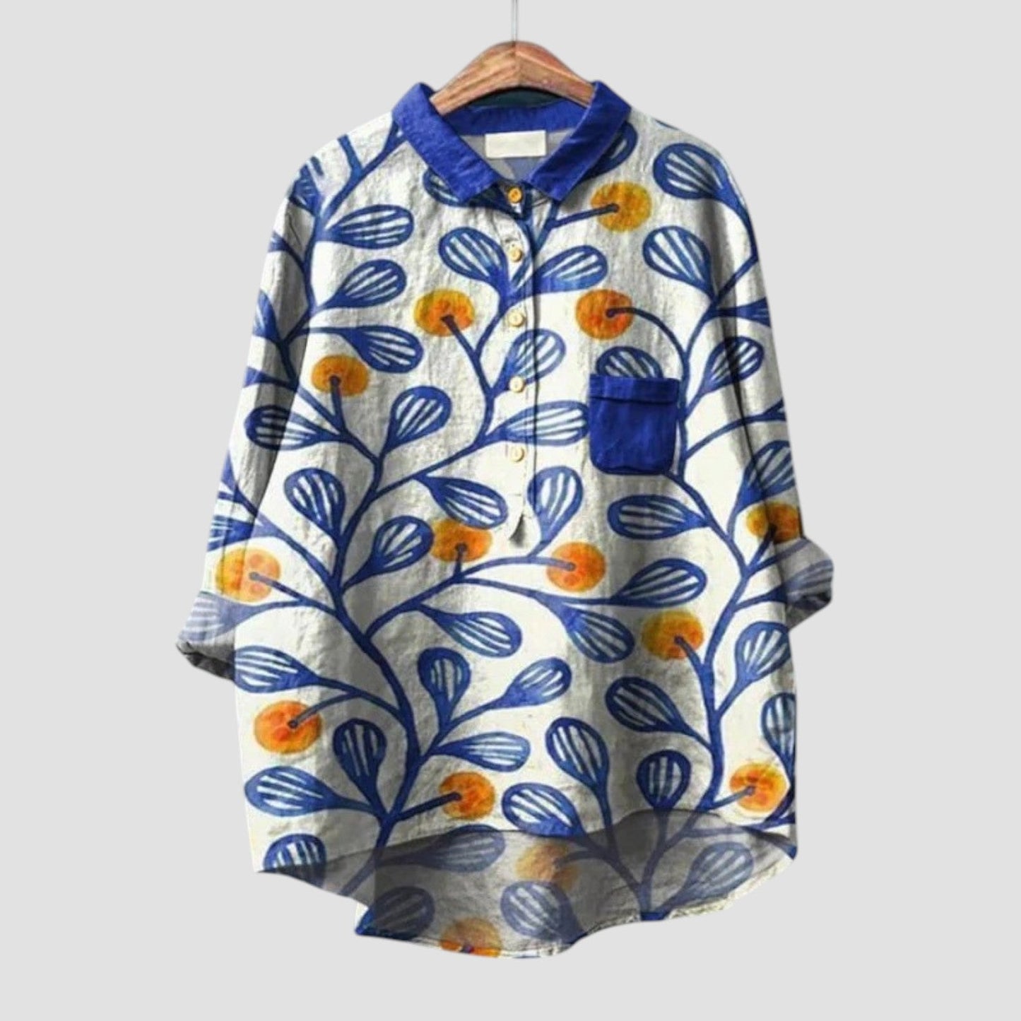 Elenya™ | 2025 – Blusa Hoja Azul
