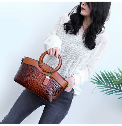 Alfrida | Bolso elegante con sofisticado grabado de cocodrilo