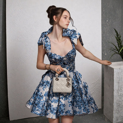 NAYELI – VESTIDO DE HOMBROS CON LAZO Y ESTAMPADO FLORAL EDEN