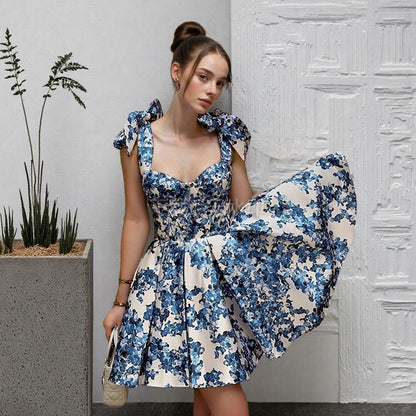 NAYELI – VESTIDO DE HOMBROS CON LAZO Y ESTAMPADO FLORAL EDEN