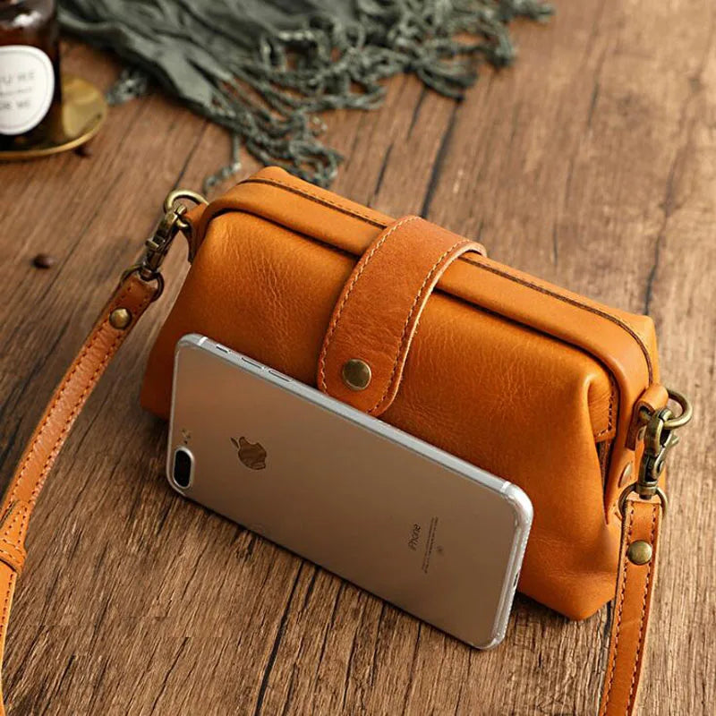 Herdis | Bolsa clásica y compacta en cálido tono cognac