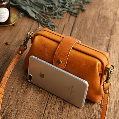 Herdis | Bolsa clásica y compacta en cálido tono cognac