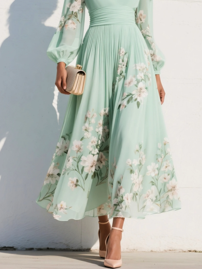 Cisella | Vestido midi verde claro con escote en V, en chiffon plisado y motivo floral