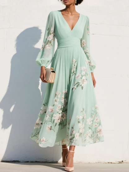 Cisella | Vestido midi verde claro con escote en V, en chiffon plisado y motivo floral