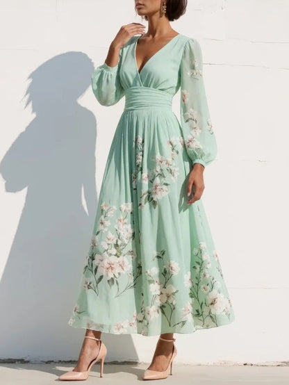 Cisella | Vestido midi verde claro con escote en V, en chiffon plisado y motivo floral