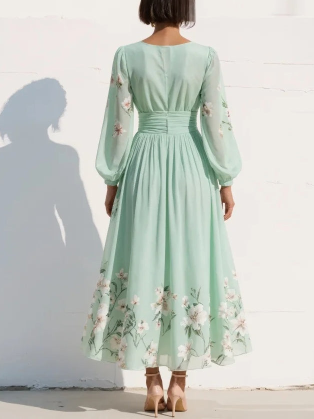 Cisella | Vestido midi verde claro con escote en V, en chiffon plisado y motivo floral