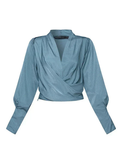 CASSANDRA – BLUSA ELEGANTE CON ESCOTE EN V DRAPEADO