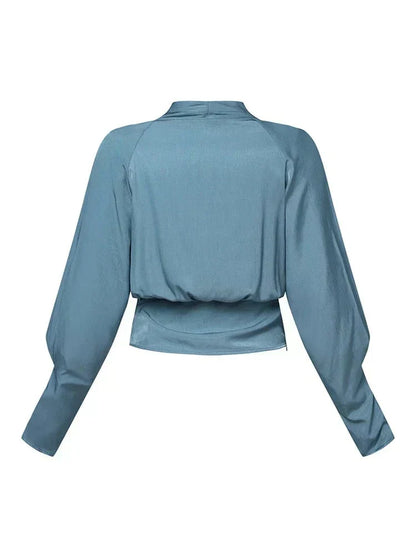 CASSANDRA – BLUSA ELEGANTE CON ESCOTE EN V DRAPEADO