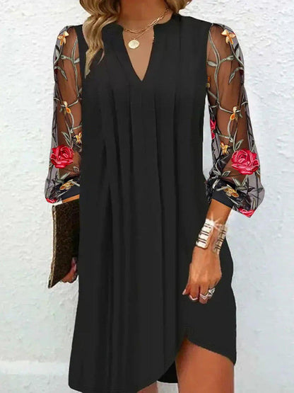 JANE – VESTIDO NEGRO ELEGANTE CON MANGAS TRANSPARENTES BORDADAS