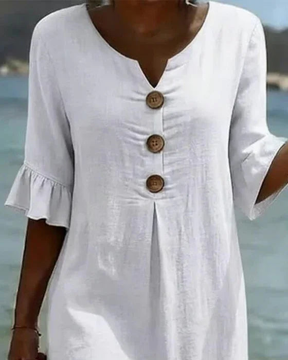 Vanesa | Vestido de lino con textura, mangas abullonadas y botones