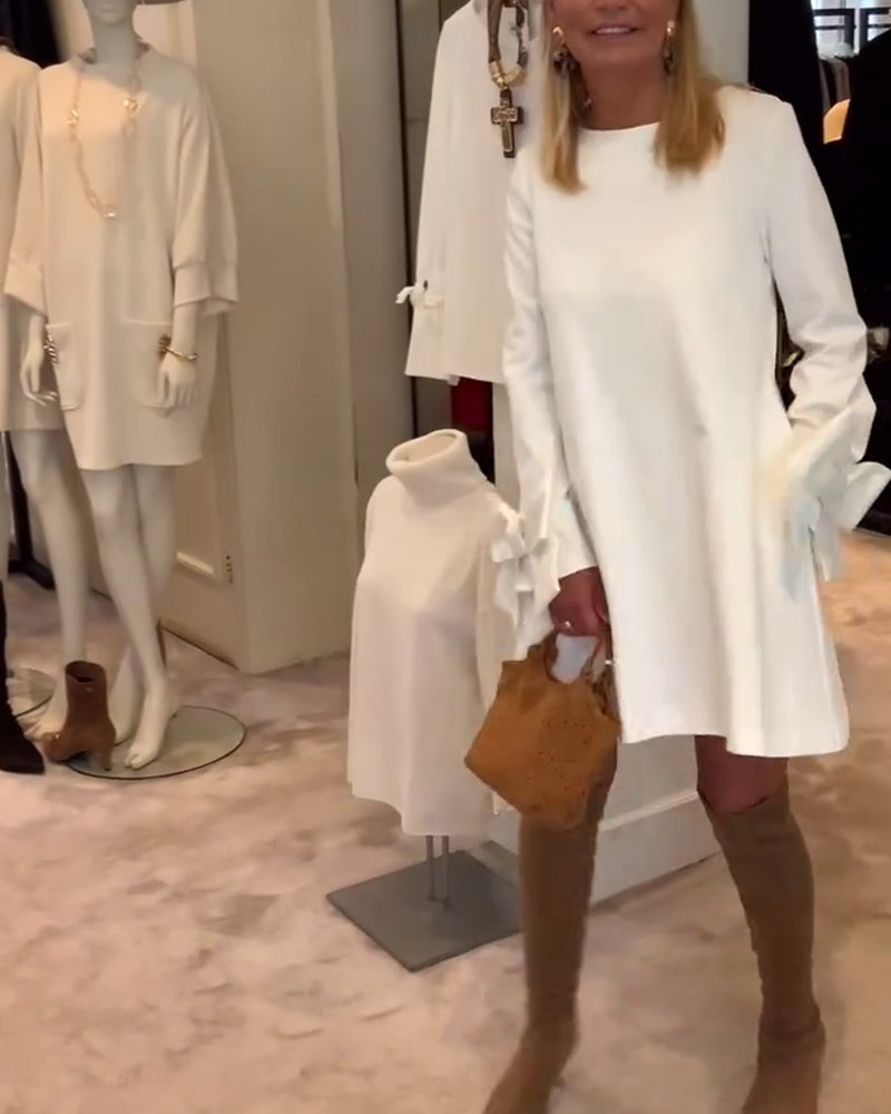 NIA – VESTIDO MINI CON MANGAS DE LAZO ELEGANTE