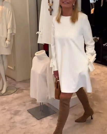 NIA – VESTIDO MINI CON MANGAS DE LAZO ELEGANTE