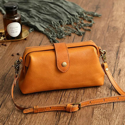 Herdis | Bolsa clásica y compacta en cálido tono cognac