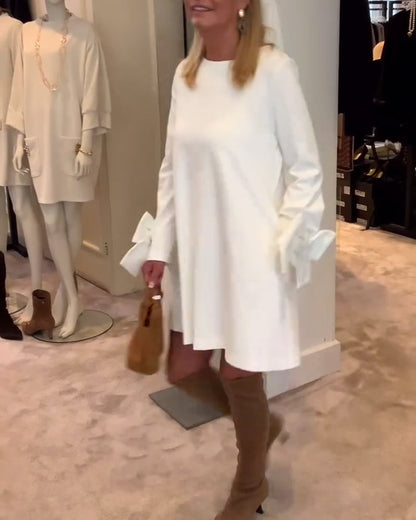 NIA – VESTIDO MINI CON MANGAS DE LAZO ELEGANTE