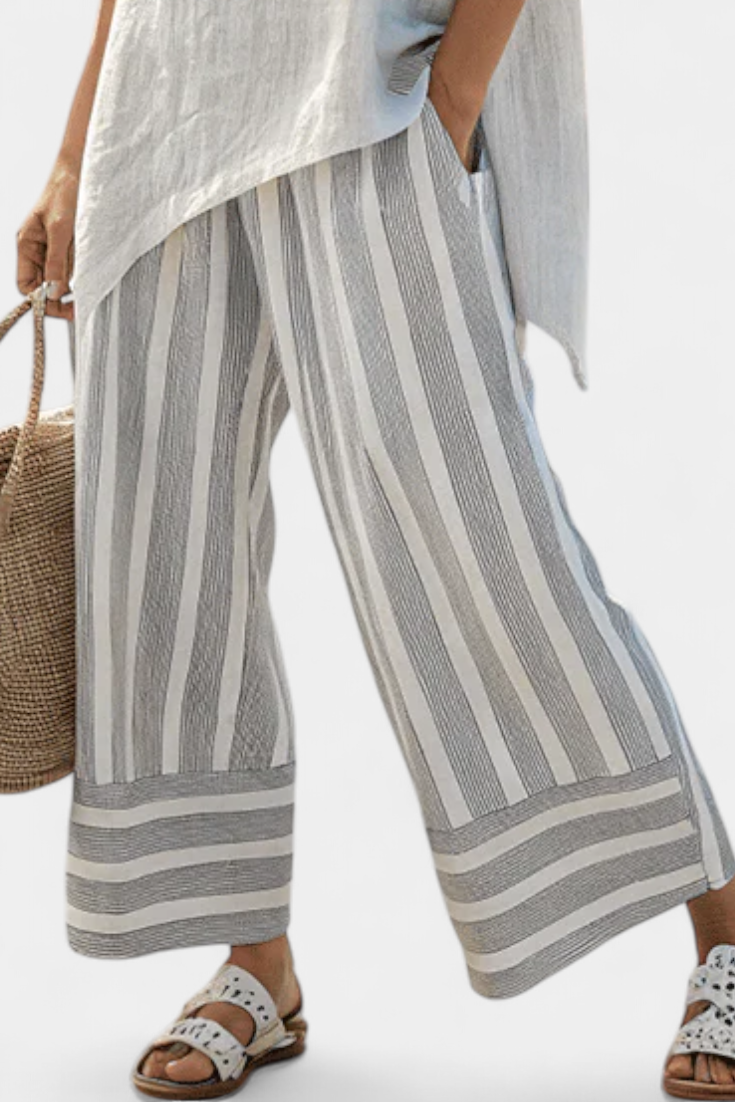 Talvora | Blusa Asimétrica Elegante y Pantalones Rayados