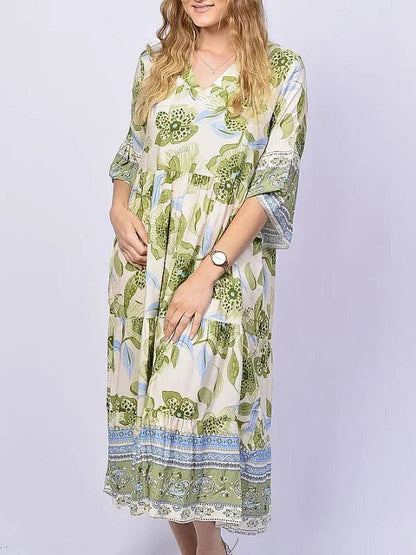 AROME - VESTIDO CON ESCOTE EN V ESTILOSO