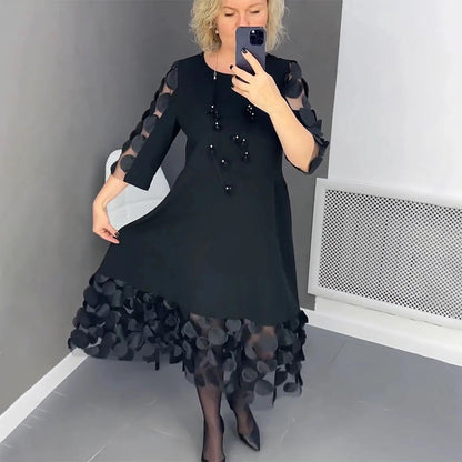 Demi | Vestido Midi Acampanado con Decoración de Lunares