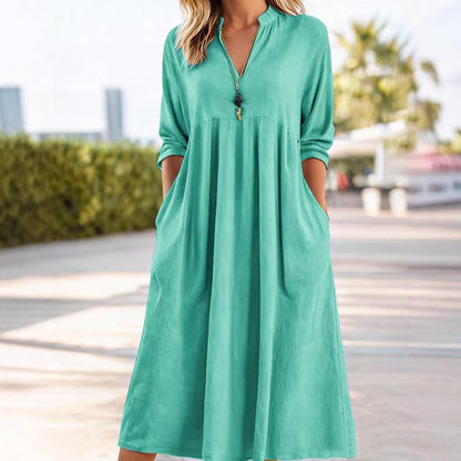 Vestido Midi Fluido con Cintura Imperio y Escote en V – Elegancia Refinada