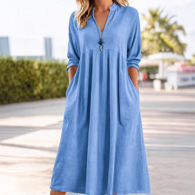 Vestido Midi Fluido con Cintura Imperio y Escote en V – Elegancia Refinada
