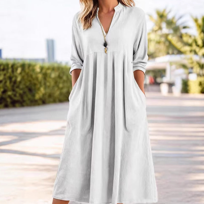 Vestido Midi Fluido con Cintura Imperio y Escote en V – Elegancia Refinada