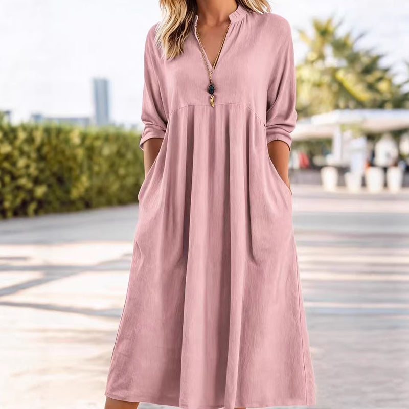 Vestido Midi Fluido con Cintura Imperio y Escote en V – Elegancia Refinada