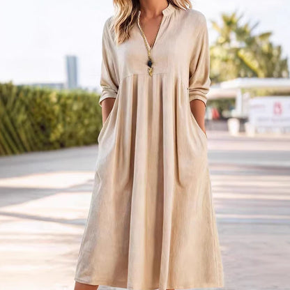 Vestido Midi Fluido con Cintura Imperio y Escote en V – Elegancia Refinada