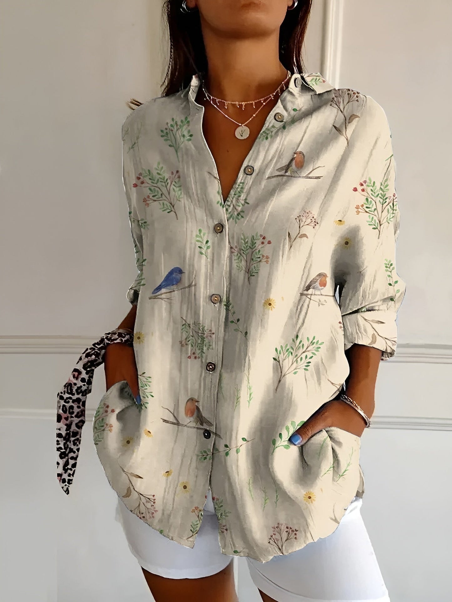 BLUSA FLORAL DESIREE CON BOTONES